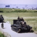 Handout photo of a Cromwell tank leading a British Army column inland from Gold Beach after landing on D-Day in Ver-sur-Mer