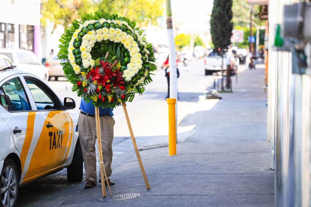 Flores velorio Mencho